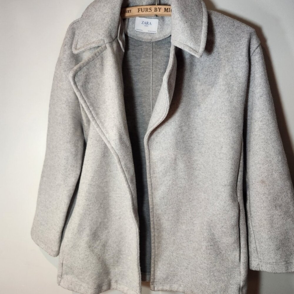 Zara small coat, no zipper Heather freebie with purchase.